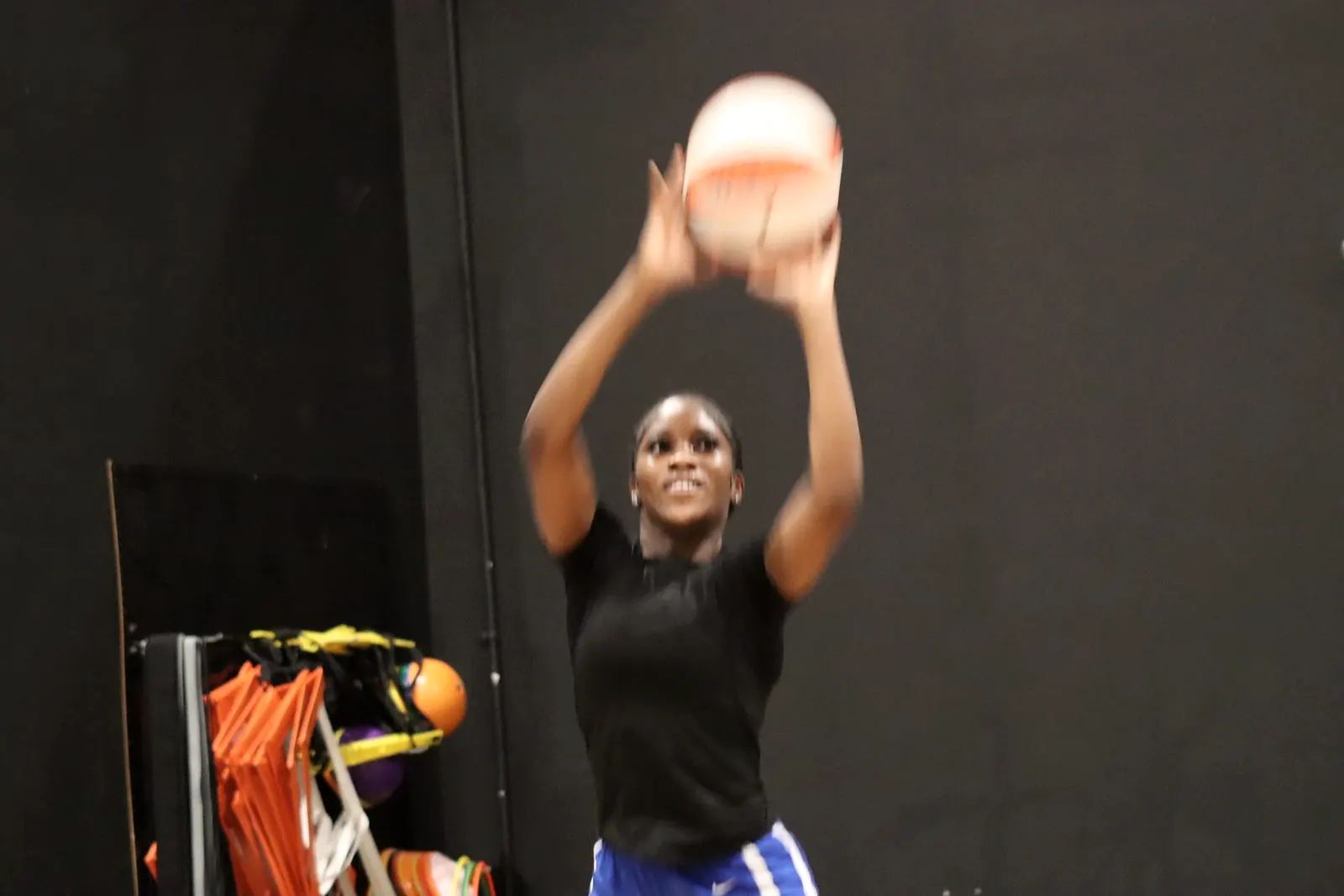An athlete working on shooting form